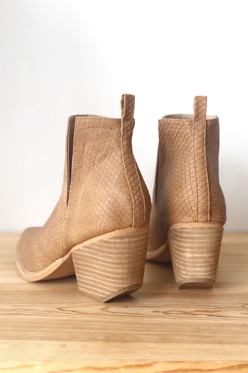 mode, whimsical side slit bootie