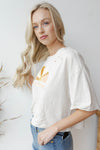 mode, radiate kindness crop tee