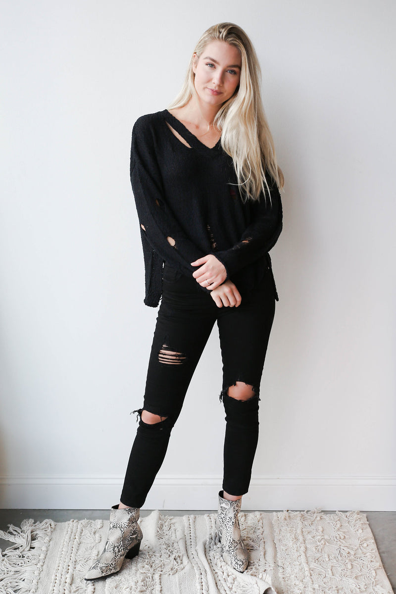 mode, not distraught sweater