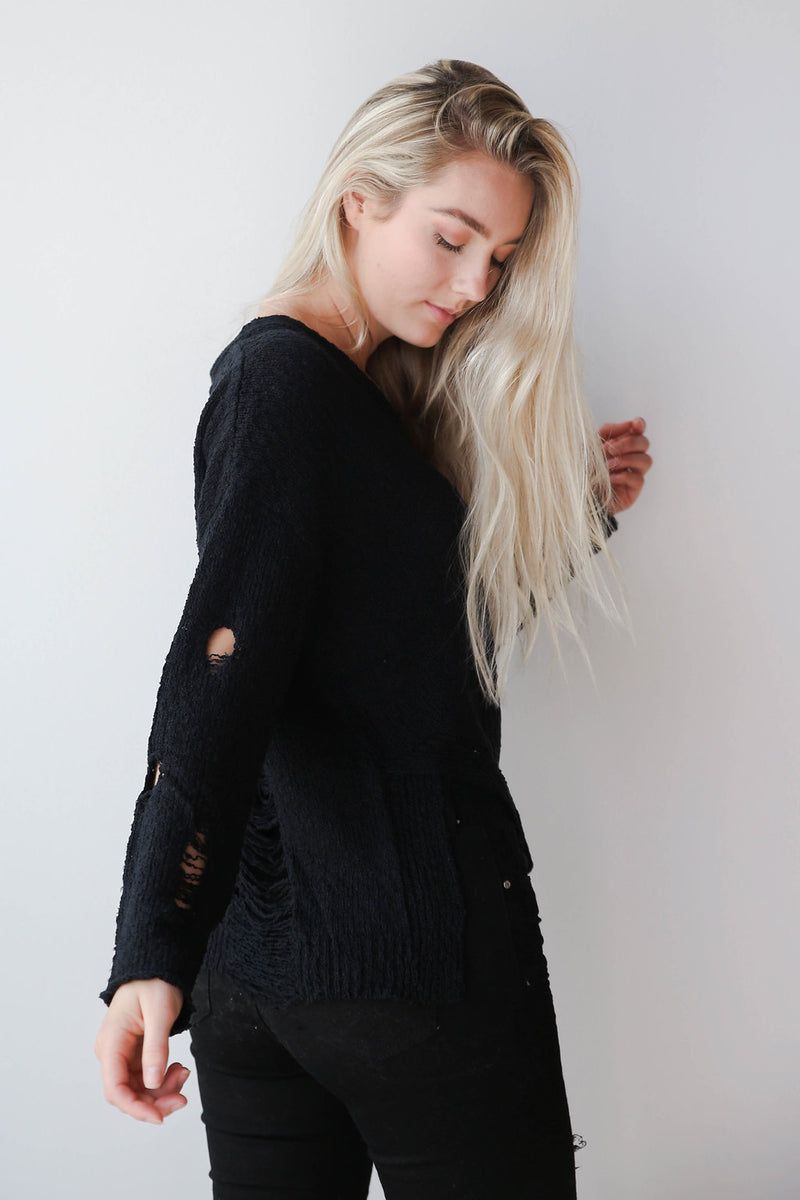 mode, not distraught sweater
