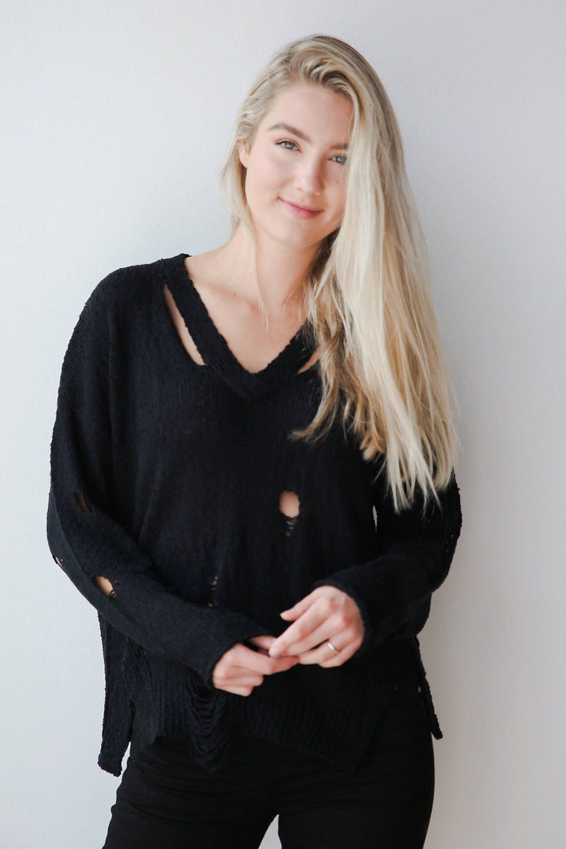 mode, not distraught sweater